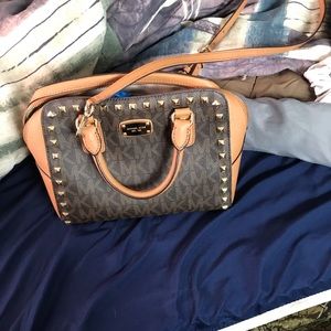 Brown and tan michael kors purse